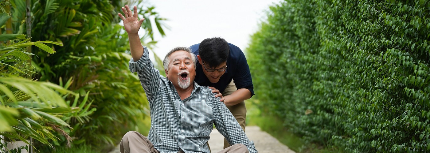 Father and son in garden